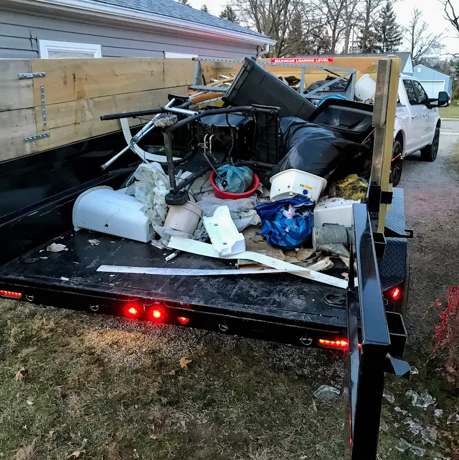 Roll-off dumpster delivered to a residential driveway in Eudora