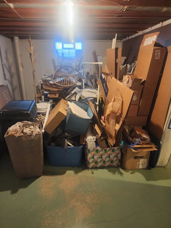 Roll-off dumpster container at job site for 6 Yard Dumpster Rental in Eudora